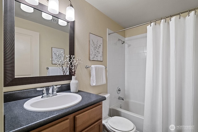 700 Front St S Unit A304, Issaquah, WA 98027 - bathroom with vanity, shower / tub combo with curtain, a textured wall, and toilet