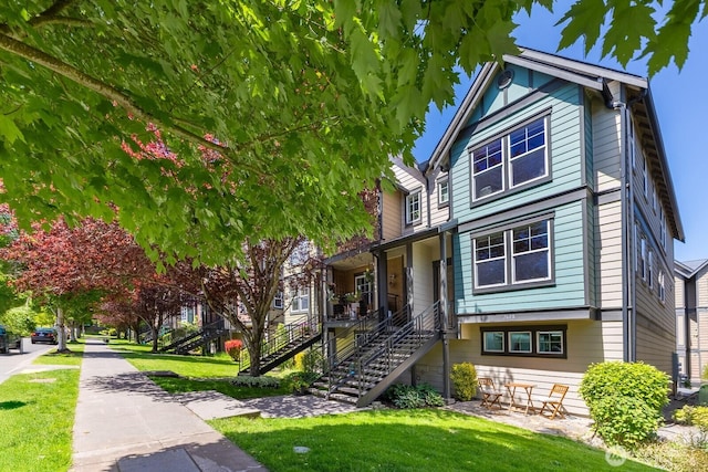 2608 SW Myrtle St, Seattle, WA 98106 - view of front of home with a front lawn and stairs
