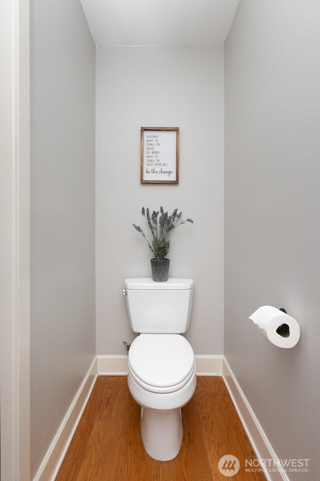 2608 SW Myrtle St, Seattle, WA 98106 - bathroom with baseboards, wood finished floors, and toilet