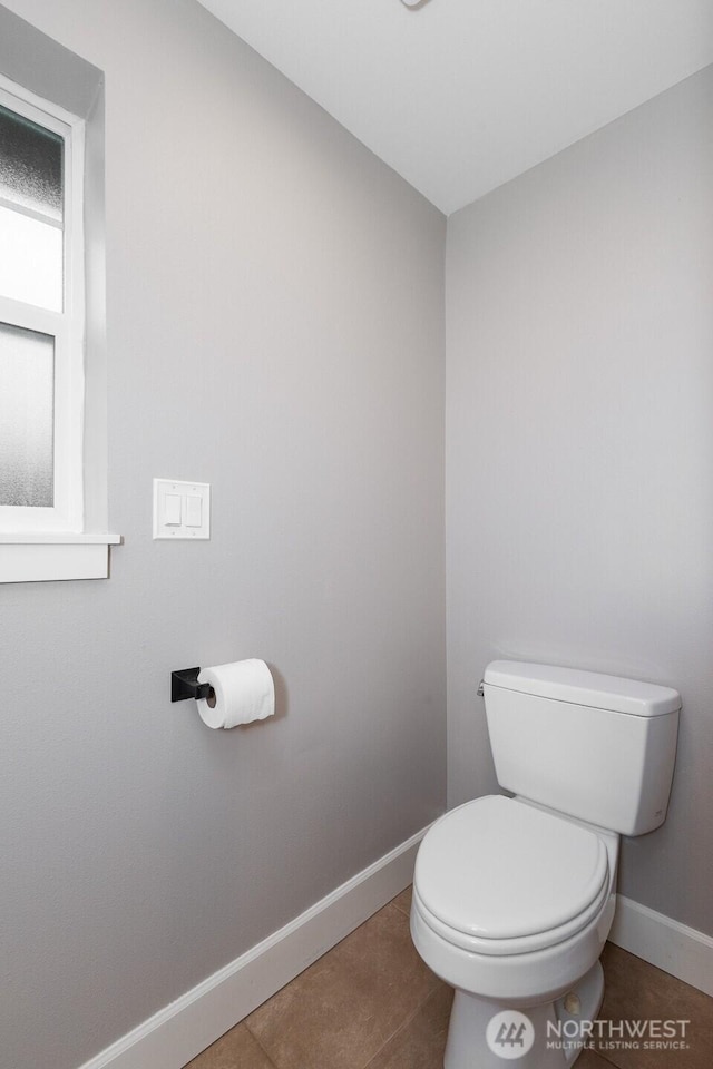 2608 SW Myrtle St, Seattle, WA 98106 - bathroom featuring baseboards, toilet, and tile patterned flooring