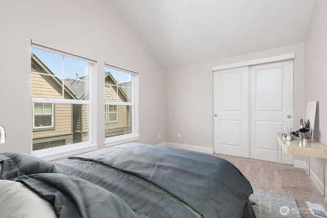 2608 SW Myrtle St, Seattle, WA 98106 - carpeted bedroom with lofted ceiling, baseboards, and a closet