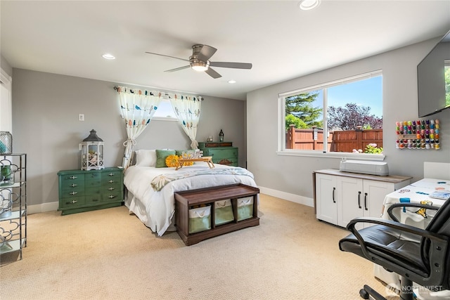 bedroom featuring recessed lighting, a ceiling fan, baseboards, and light carpet