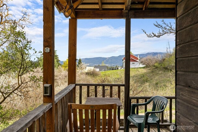 balcony featuring a mountain view