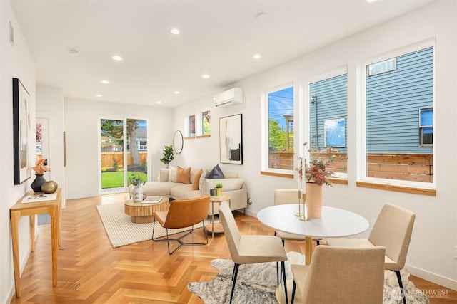 dining space with an AC wall unit, recessed lighting, baseboards, and visible vents