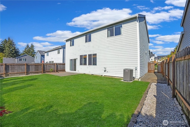 17422 90th Ave E, Puyallup, WA 98375 - back of house featuring central AC, a residential view, and a patio area