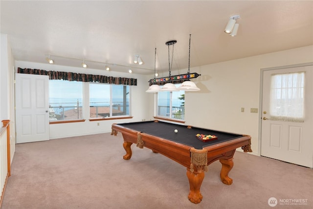 game room with carpet, pool table, track lighting, and baseboards