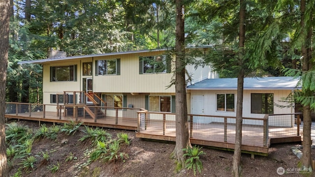 540 SW Fernwood St, Issaquah, WA 98027 - back of house with a chimney and a deck