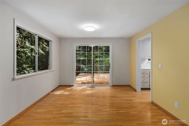 540 SW Fernwood St, Issaquah, WA 98027 - spare room with light wood-style floors and baseboards