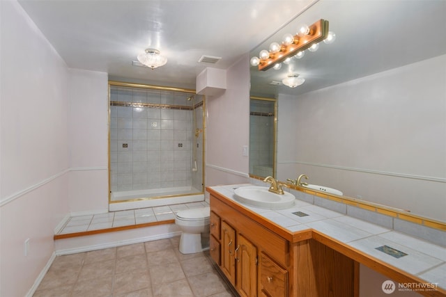 540 SW Fernwood St, Issaquah, WA 98027 - bathroom with toilet, vanity, and tile patterned floors
