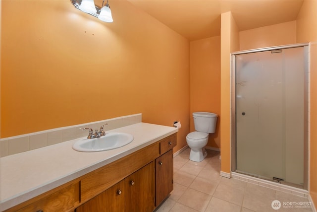540 SW Fernwood St, Issaquah, WA 98027 - full bathroom featuring tile patterned floors, a shower stall, toilet, and vanity