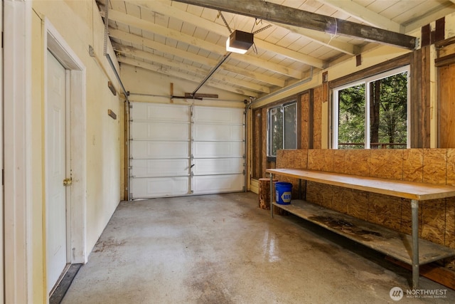 540 SW Fernwood St, Issaquah, WA 98027 - garage with wood ceiling and a garage door opener
