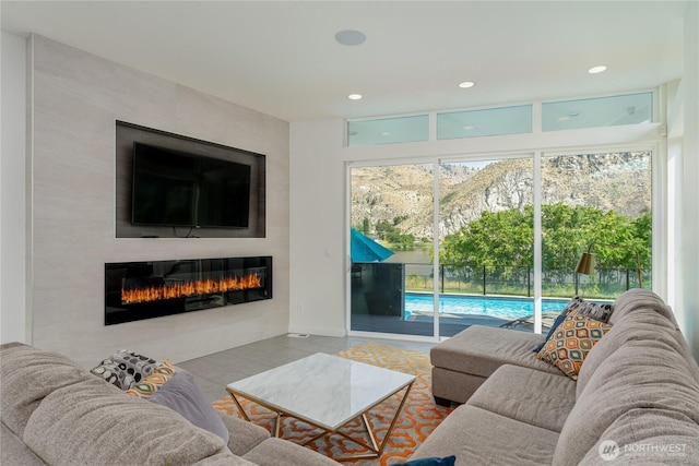 64 Orchard Pl, Orondo, WA 98843 - living area featuring recessed lighting, a large fireplace, and tile patterned flooring