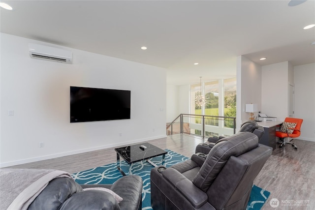 64 Orchard Pl, Orondo, WA 98843 - living room with a wall mounted AC, recessed lighting, and wood finished floors