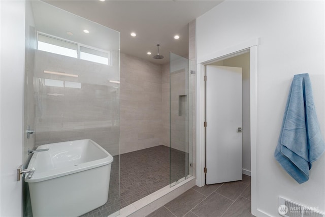 64 Orchard Pl, Orondo, WA 98843 - bathroom with visible vents, tile patterned flooring, a soaking tub, recessed lighting, and tiled shower