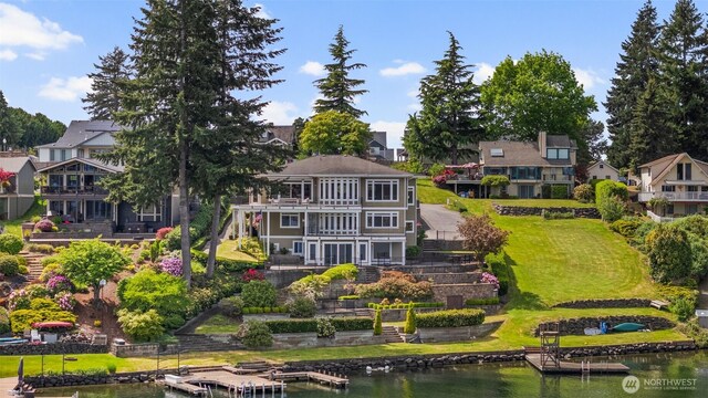 26408 136th Ave SE, Kent, WA 98042 - back of property with stairs, a balcony, a residential view, a lawn, and a deck with water view
