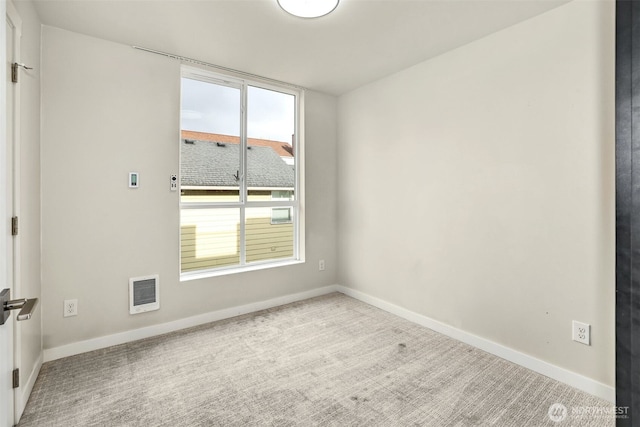 1400 N 95th St, Seattle, WA 98103 - carpeted empty room featuring baseboards and visible vents