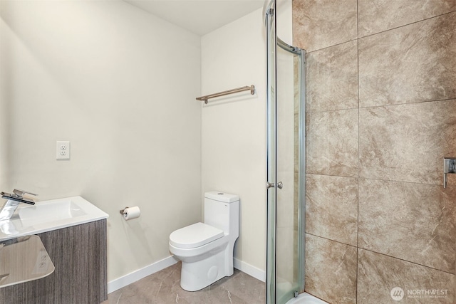 1400 N 95th St, Seattle, WA 98103 - full bathroom featuring vanity, toilet, baseboards, and a shower stall