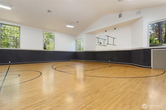 view of sport court with community basketball court and a wealth of natural light
