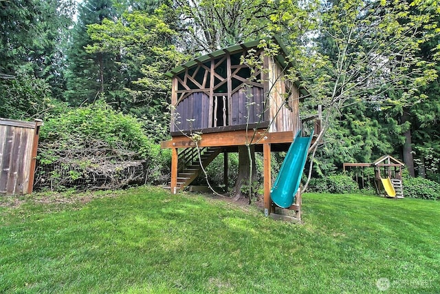 view of jungle gym featuring a yard