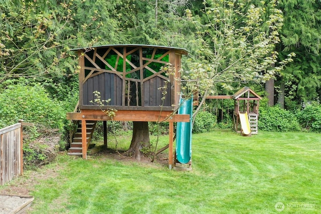 view of play area with a yard