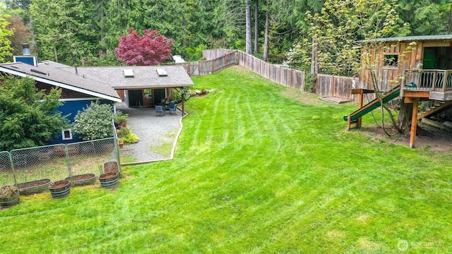 view of yard with a patio and a fenced backyard