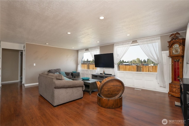 living room featuring recessed lighting and wood finished floors