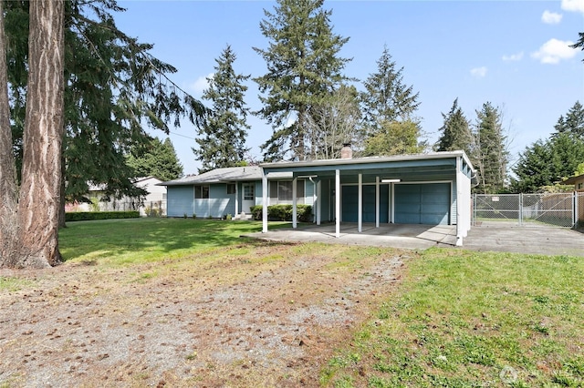 801 141st St S, Tacoma, WA 98444 - rear view of property with fence, a lawn, a gate, and concrete driveway