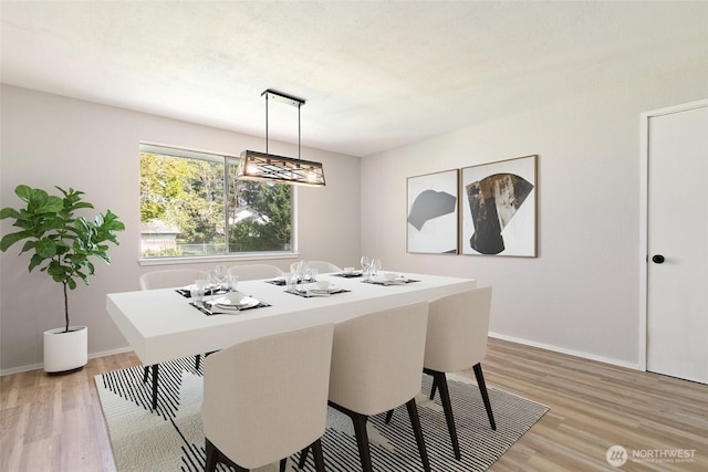 801 141st St S, Tacoma, WA 98444 - dining room with baseboards and light wood-style floors