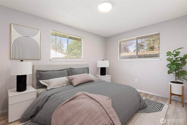 801 141st St S, Tacoma, WA 98444 - bedroom featuring baseboards and wood finished floors