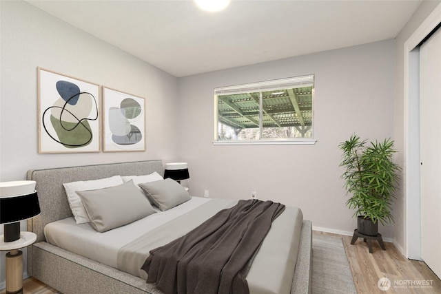 801 141st St S, Tacoma, WA 98444 - bedroom featuring baseboards and light wood-type flooring