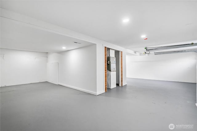 finished below grade area with recessed lighting and visible vents
