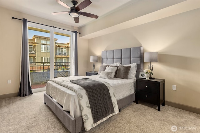bedroom with baseboards, access to exterior, and light colored carpet