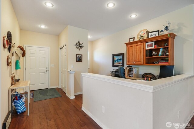 foyer featuring recessed lighting, baseboards, and dark wood finished floors