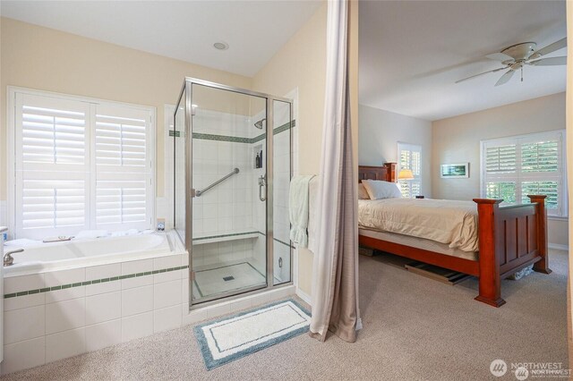 ensuite bathroom with a garden tub, connected bathroom, ceiling fan, and a shower stall