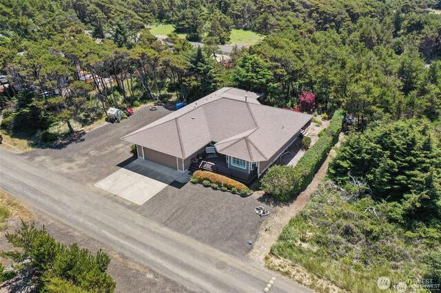 aerial view featuring a forest view