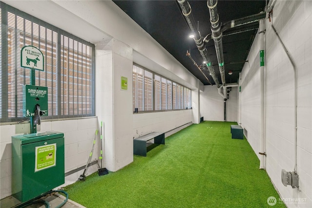 1321 Seneca St Unit 1008, Seattle, WA 98101 - interior space featuring concrete block wall and carpet flooring