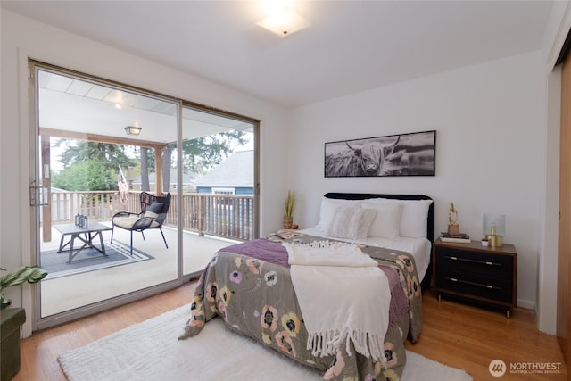 12223 4th Ave NW, Seattle, WA 98177 - bedroom with wood finished floors and access to exterior