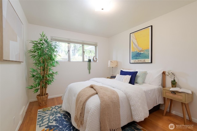 12223 4th Ave NW, Seattle, WA 98177 - bedroom with baseboards and wood finished floors