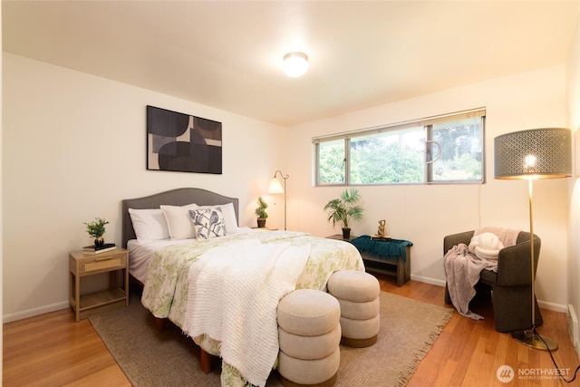 12223 4th Ave NW, Seattle, WA 98177 - bedroom with baseboards and wood finished floors