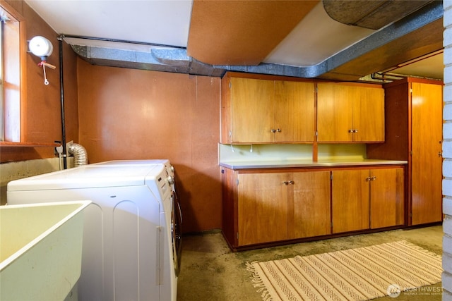 12223 4th Ave NW, Seattle, WA 98177 - laundry area featuring a sink, cabinet space, and washer and clothes dryer