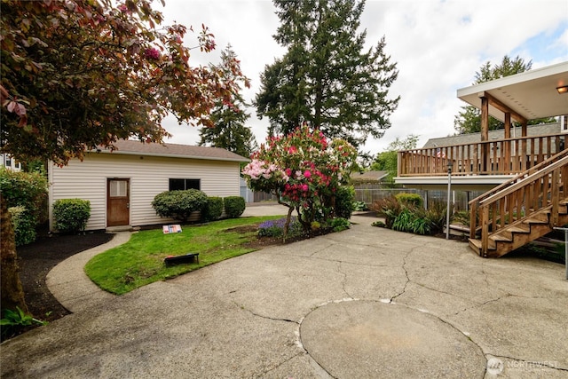 12223 4th Ave NW, Seattle, WA 98177 - view of yard featuring fence, a deck, a patio area, and stairway