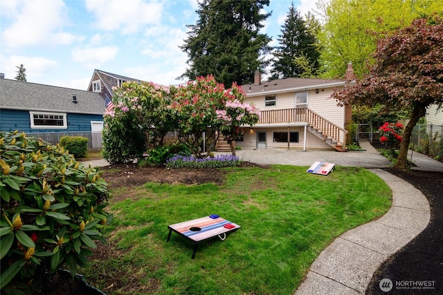 12223 4th Ave NW, Seattle, WA 98177 - view of yard featuring fence, stairs, a wooden deck, and a patio