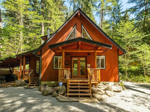 7502 Glacier Spgs, Deming, WA 98244 - chalet / cabin featuring french doors and covered porch