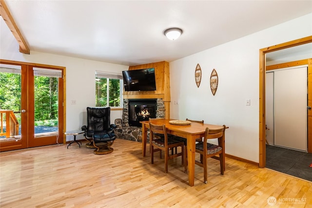 7502 Glacier Spgs, Deming, WA 98244 - dining area featuring light wood-type flooring and a fireplace