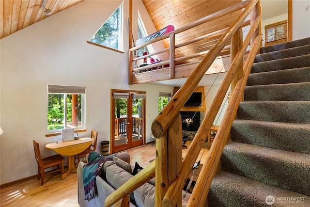 7502 Glacier Spgs, Deming, WA 98244 - stairway with wood ceiling, wood finished floors, high vaulted ceiling, and french doors