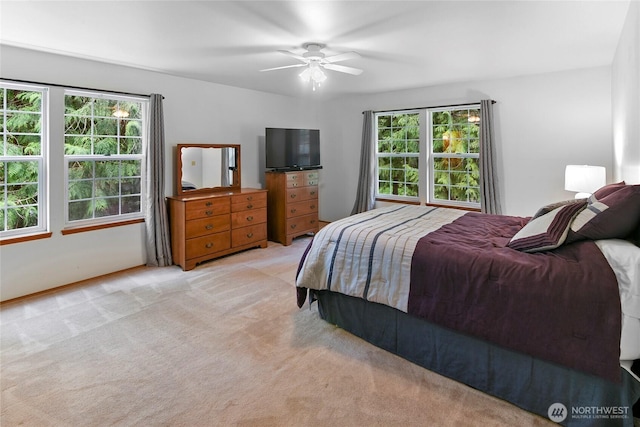 bedroom featuring carpet and ceiling fan