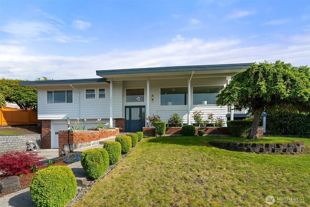 13445 SE 43rd St, Bellevue, WA 98006 - bi-level home with an attached garage, a front lawn, brick siding, and a porch