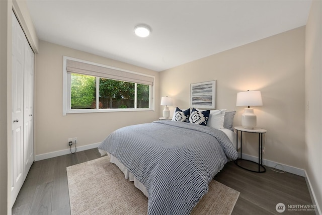 13445 SE 43rd St, Bellevue, WA 98006 - bedroom featuring a closet, baseboards, and wood finished floors