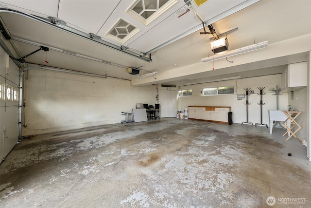 13445 SE 43rd St, Bellevue, WA 98006 - garage featuring a garage door opener