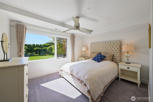 bedroom with carpet flooring, visible vents, baseboards, and ceiling fan